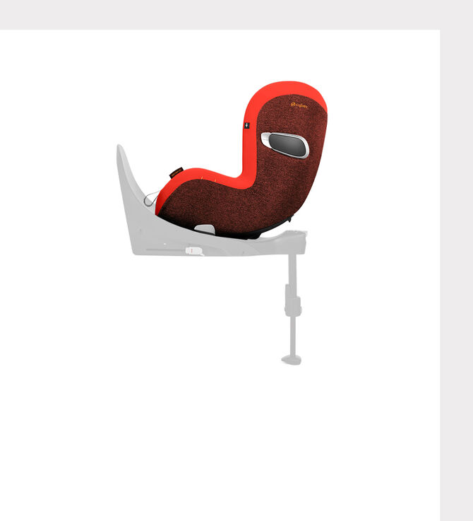 Red and brown Cloud Z2 child car seat on a white base.