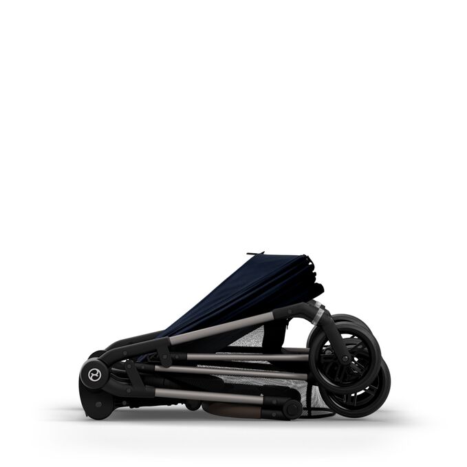 An image of the CYBEX Gold Melio Stroller, highlighting the Compact Fold feature.