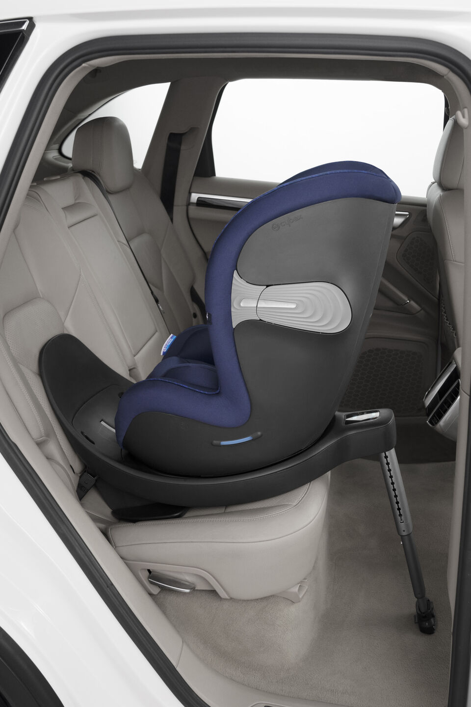 A child car seat installed in the back seat of a car.