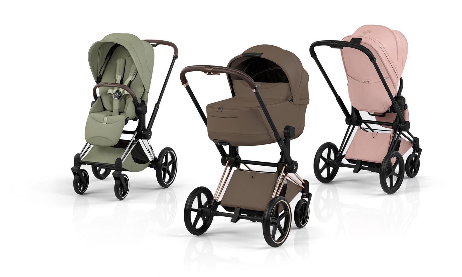 Three Priam Style strollers next to each other in different colors and with different attachments.