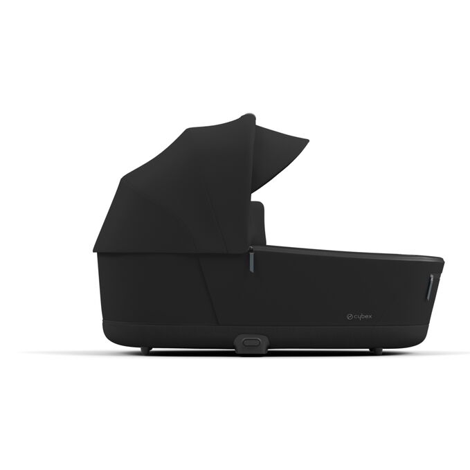 An image of the CYBEX Platinum Priam Lux Carry Cot Stroller, highlighting the Sun canopy with integrated sun visor feature.