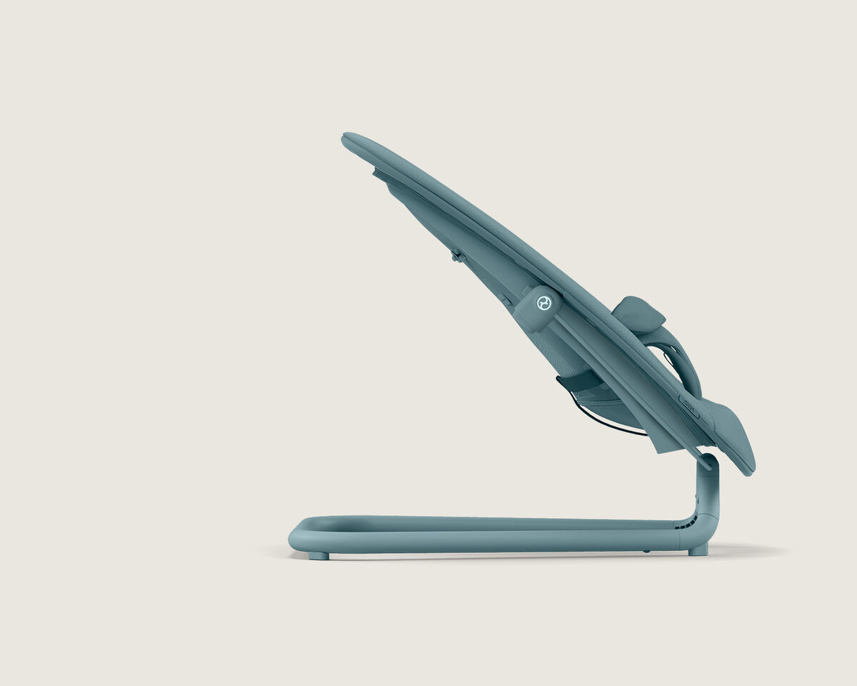 Side view of the Bouncer baby bouncer in a modern blue design.