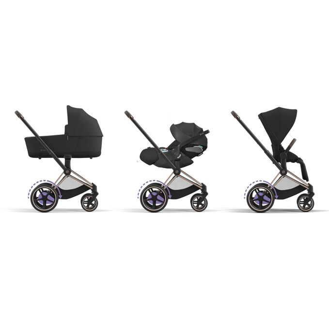 Ein Bild des CYBEX Platinum e-Priam Jeremy Scott - Wings Stroller, das das Merkmal Reisesystem hervorhebt.