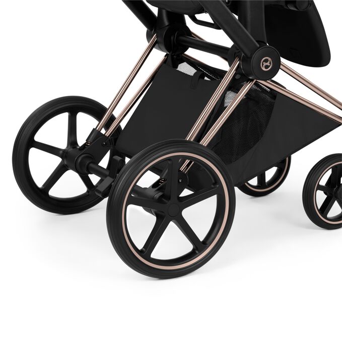 An image of the CYBEX Platinum Priam/e-Priam Seat Pack - Style Collection Stroller, highlighting the Extra-large Color-matching Basket feature.