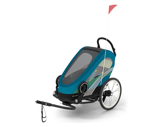 Blue Zeno Bike bike trailer for kids with a red flag.